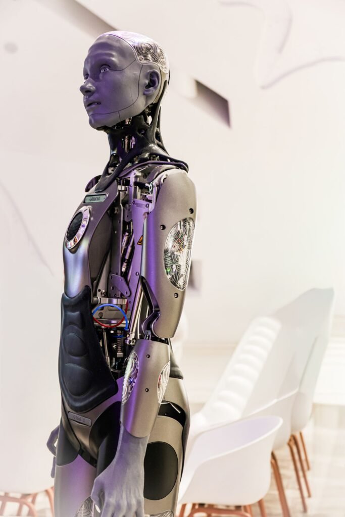 Humanoid robot standing in a modern conference room