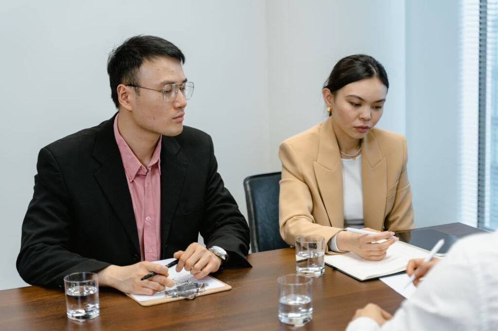Team of professionals meeting around a table