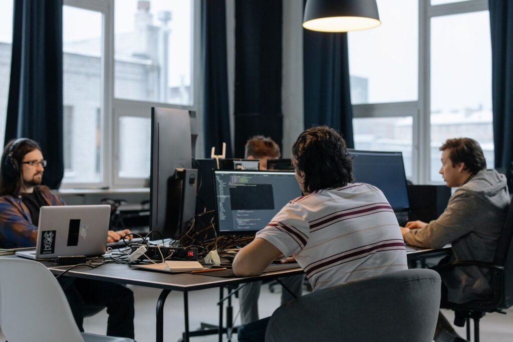 Developers working at computers in a tech office