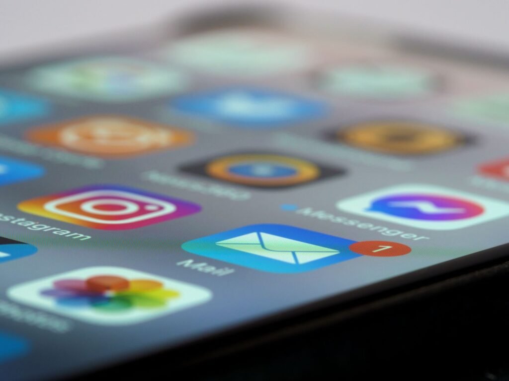 Smartphone screen showing app icons and notification badges
