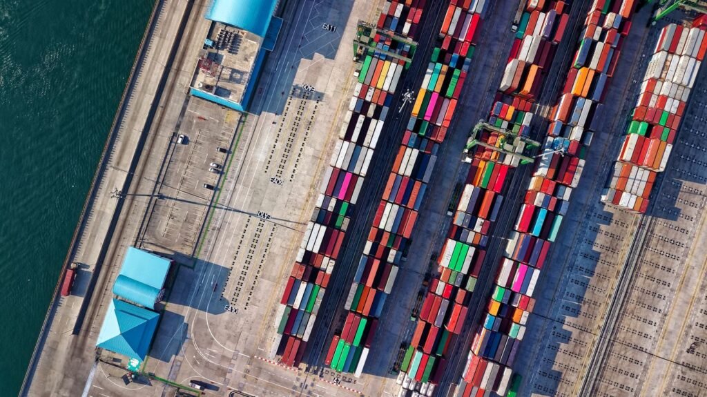 Aerial view of rows of colourful shipping containers at a port in Jakarta, Indonesia