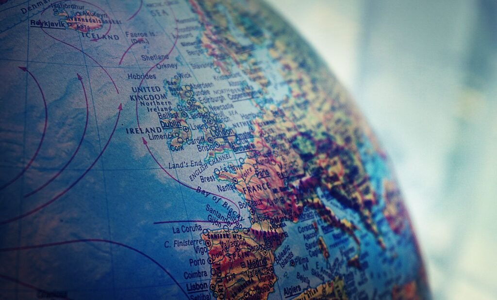 Shallow focus photo of a world globe on a desk